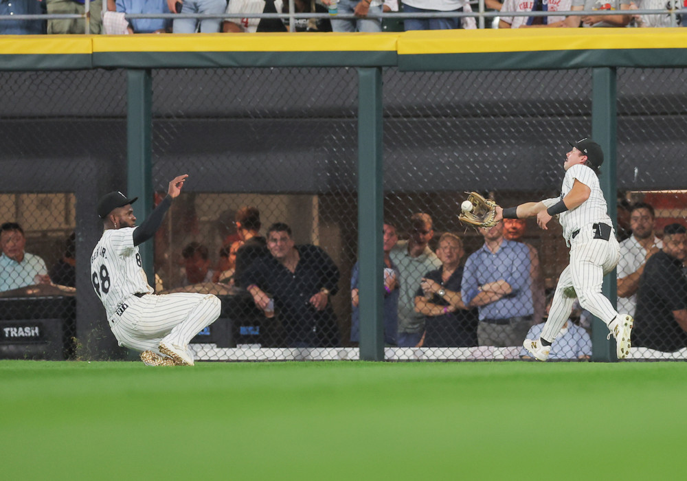 Dominic Fletcher makes a reaching catch in right center field